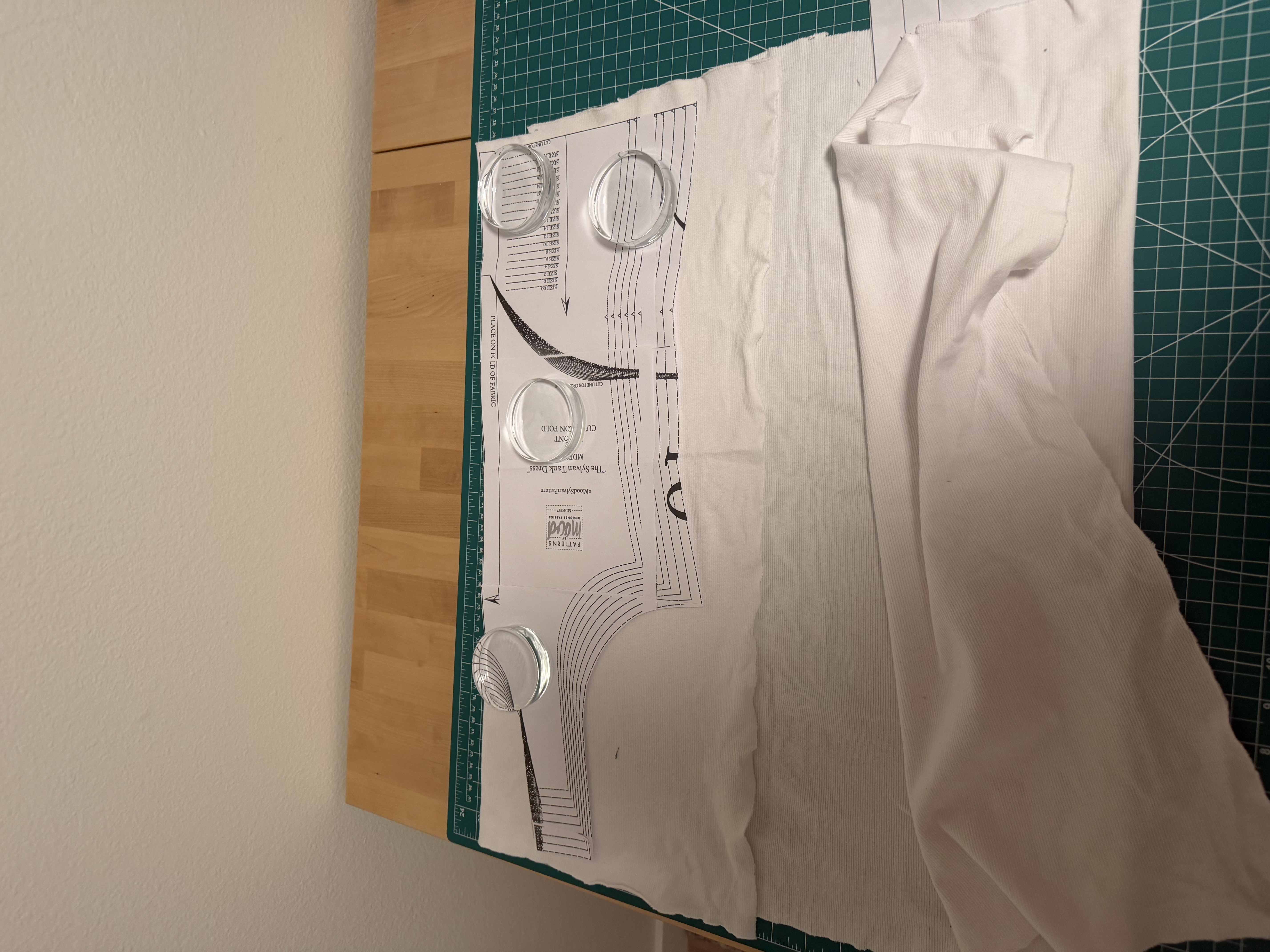 Cutting the Sylvan Tank pattern pieces from the white rib knit fabric